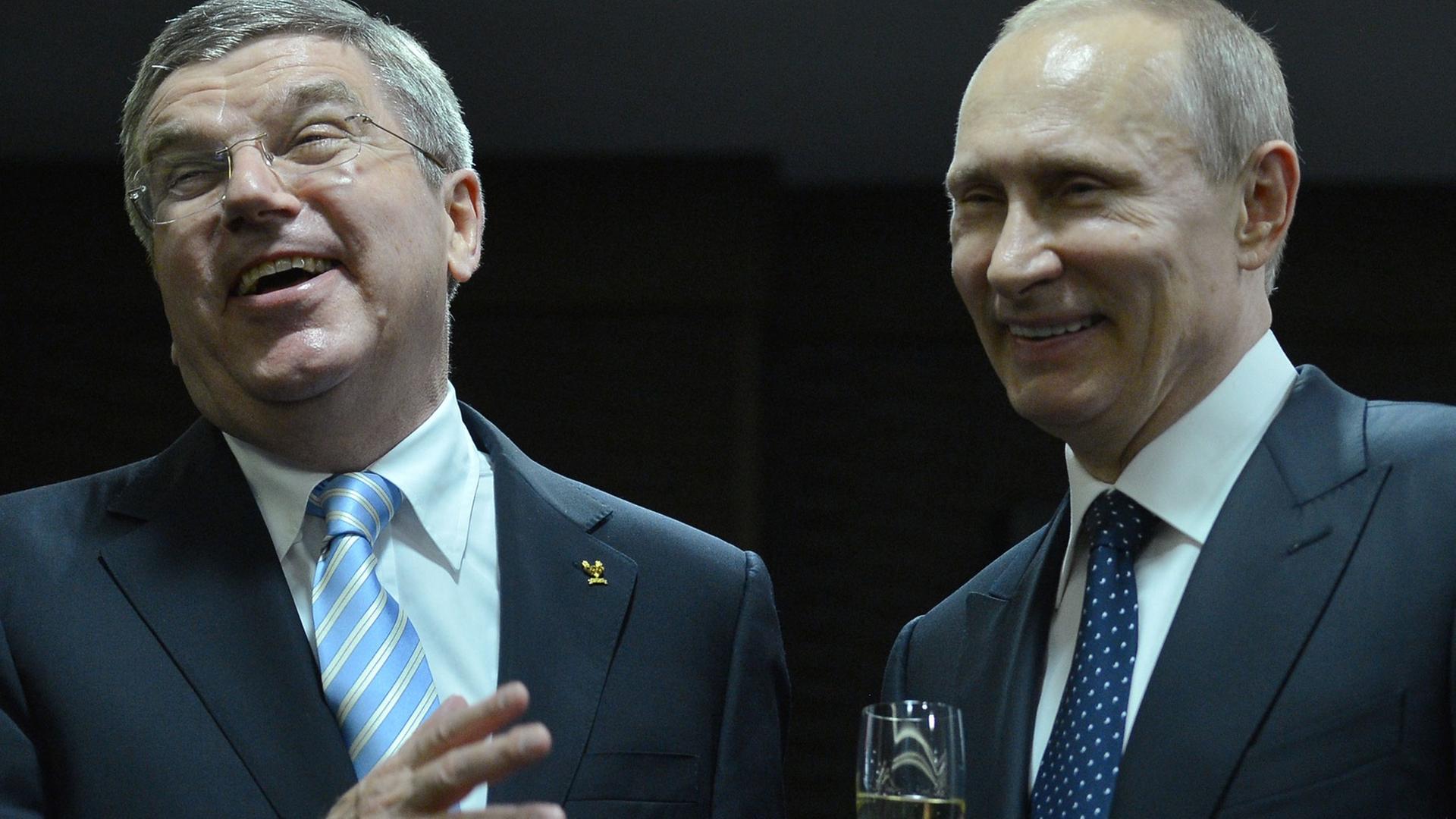 IOC-Präsident Thomas Bach und Russlands Präsident Wladimir Putin in Sotschi 2014. IOC-Präsident Thomas Bach und Russlands Präsident Wladimir Putin in Sotschi 2014.