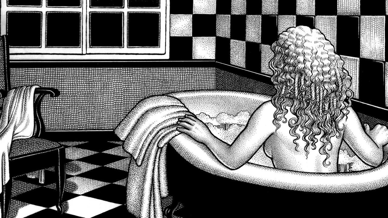 Eine Frau sitzt in der Badewanne.