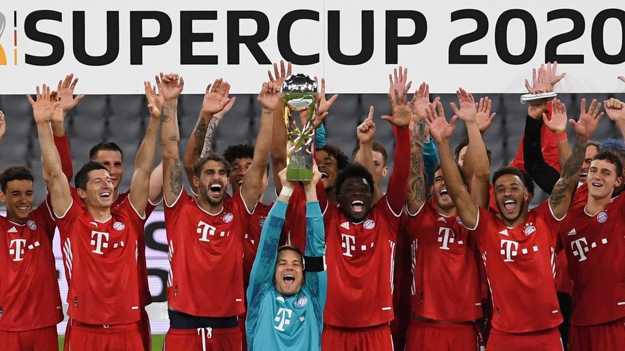 Die Spieler von Bayern München jubeln. Die Spieler von Bayern München jubeln.