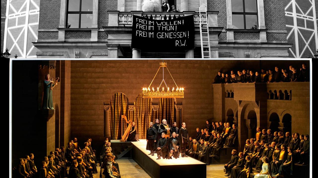 Zu sehen ist die Bühne der Bayreuther Festspiele. Auf dieser versammelt sich die Sängergemeinde zum Wettstreit. Über der Bühne ist eine Schwarzweiß-Videoprojektion zu sehen. Diese stellt die Außenfassade des Festpielhauses dar. Auf dessen Balkon stehen eine Drag-Queen und ein Zwerg. Sie haben ein Transparent mit der Aufschrift: "Frei im Wollen! Frei im Tun! Frei im Genießen!" entrollt. Zu sehen ist die Bühne der Bayreuther Festspiele. Auf dieser versammelt sich die Sängergemeinde zum Wettstreit. Über der Bühne ist eine Schwarzweiß-Videoprojektion zu sehen. Diese stellt die Außenfassade des Festpielhauses dar. Auf dessen Balkon stehen eine Drag-Queen und ein Zwerg. Sie haben ein Transparent mit der Aufschrift: "Frei im Wollen! Frei im Tun! Frei im Genießen!" entrollt.