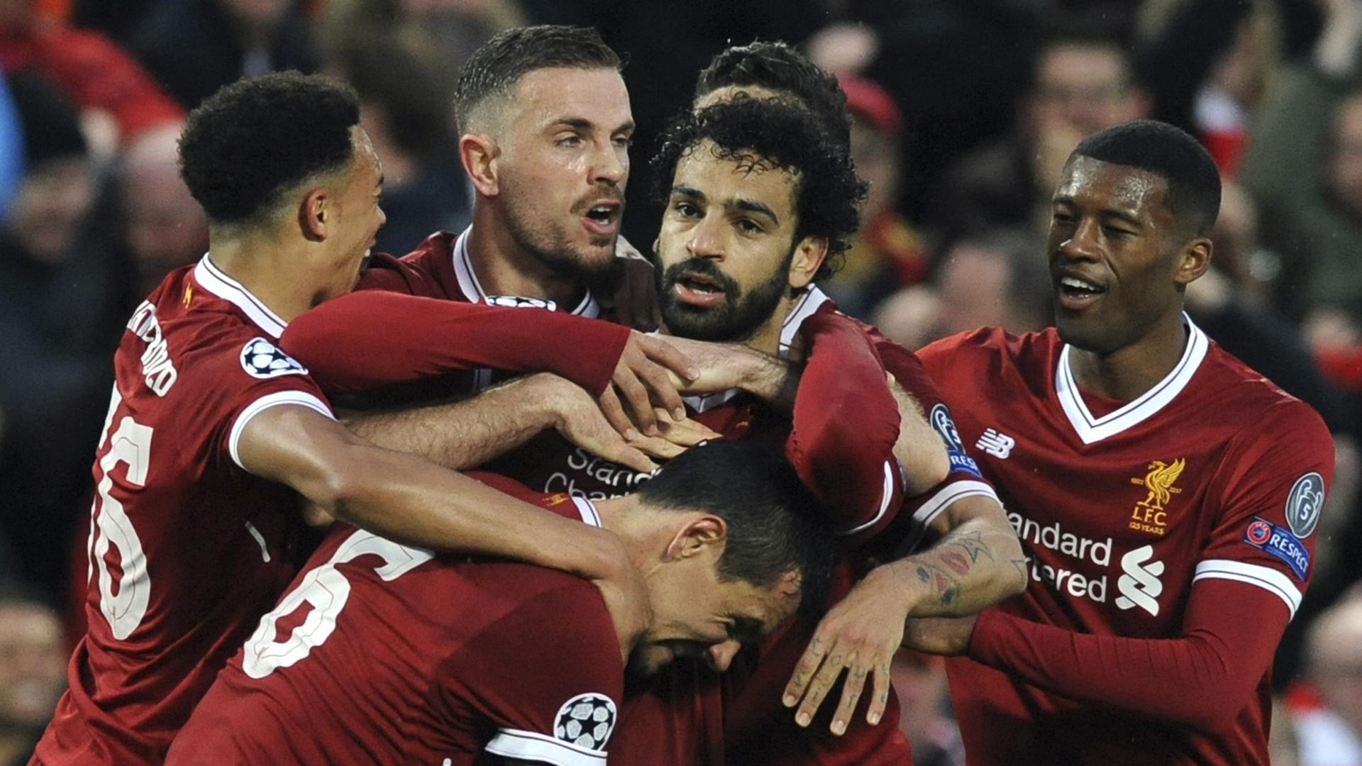 Champions League-Halbfinale: FC Liverpool - AS Rom. Mohamed Salah (M) vom FC Liverpool jubelt mit seinen Teamkollegen über seinen Treffer zum 1:0. Champions League-Halbfinale: FC Liverpool - AS Rom. Mohamed Salah (M) vom FC Liverpool jubelt mit seinen Teamkollegen über seinen Treffer zum 1:0.