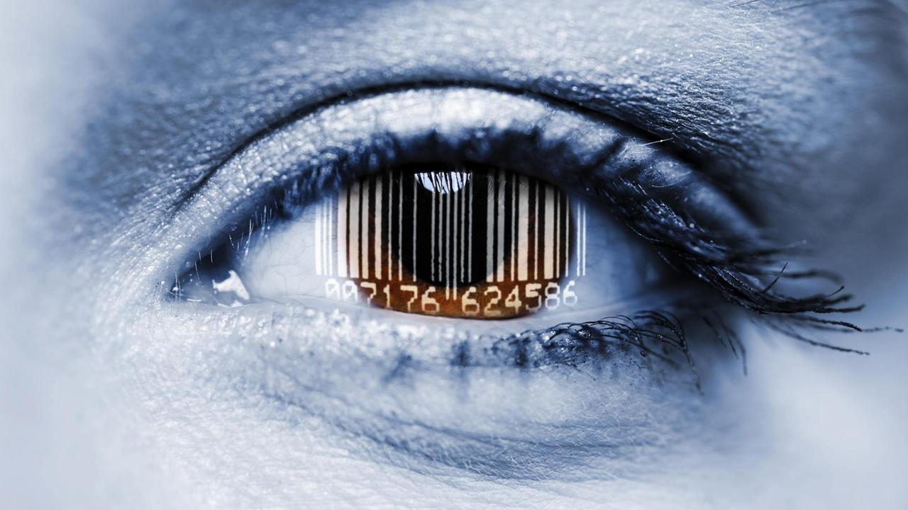 Ein Barcode spiegelt sich in einem Auge
