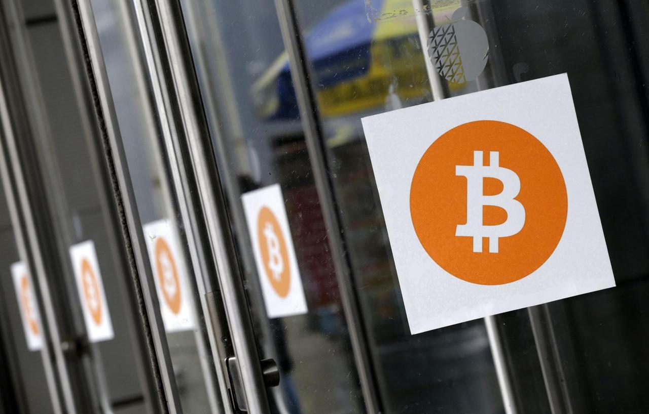 Das Archivbild von 2014 zeigt das Bitcoin-Logo, ein weißes "B" auf orangefarbenem Grund.