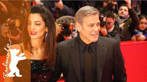 Der Schauspieler George Clooney und seine Frau Amal bei der 66. Berlinale. Clooney spielt in dem Eröffnungsfilm "Hail, Caesar!" von den Coen Brüdern.