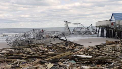 Zerstörte Strandpromenade in New Jersey: Vor Hurrikan "Sandy" mieden die US-Wahlkämpfer das Thema Klimawandel