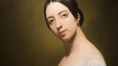 Gemälde mit Porträt der jungen Sängerin Pauline Viardot, die ihren Kopf Richtung Betrachter dreht und neigt, während sie ein schlichtes, schwarzes Kleid trägt.