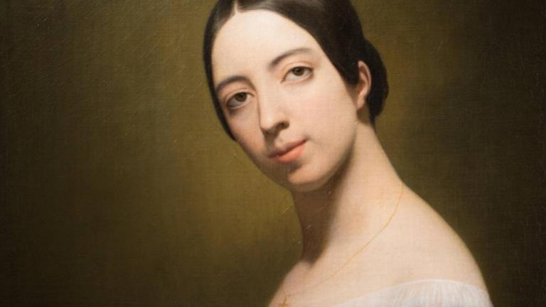 Gemälde mit Porträt der jungen Sängerin Pauline Viardot, die ihren Kopf Richtung Betrachter dreht und neigt, während sie ein schlichtes, schwarzes Kleid trägt. Gemälde mit Porträt der jungen Sängerin Pauline Viardot, die ihren Kopf Richtung Betrachter dreht und neigt, während sie ein schlichtes, schwarzes Kleid trägt.