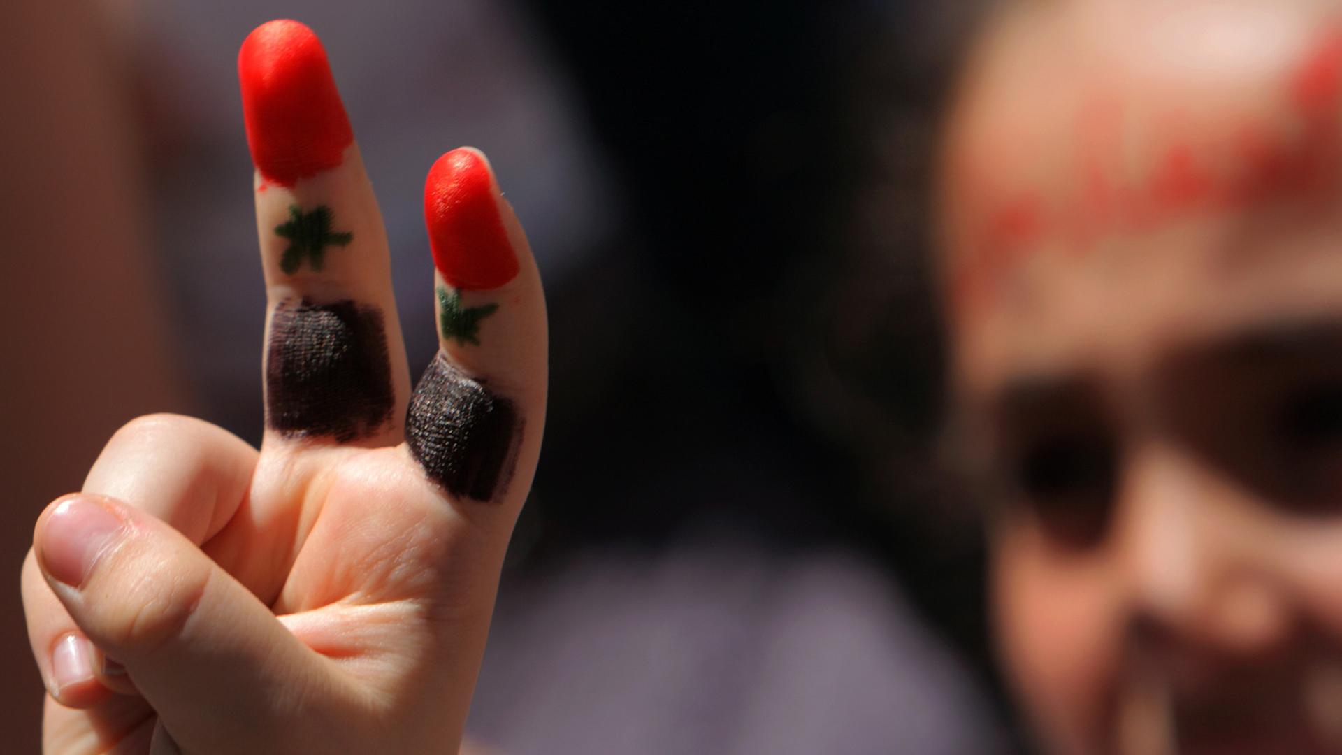 Zwei Finger in den syrischen Nationalfarben: Die Stimmung zu Beginn der Proteste war noch optimistisch