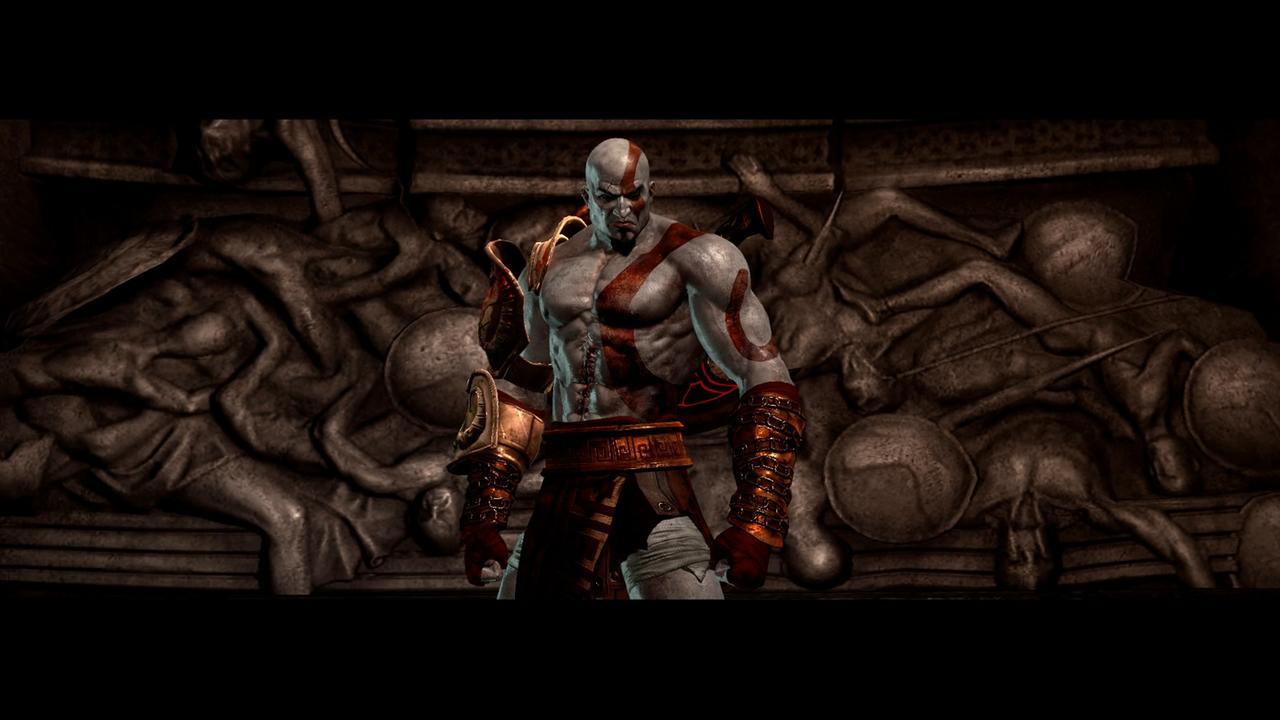 Ein Screenshot aus "God of War® III Remastered", der Held Kratos steht grimmig blickend vor einem Relief