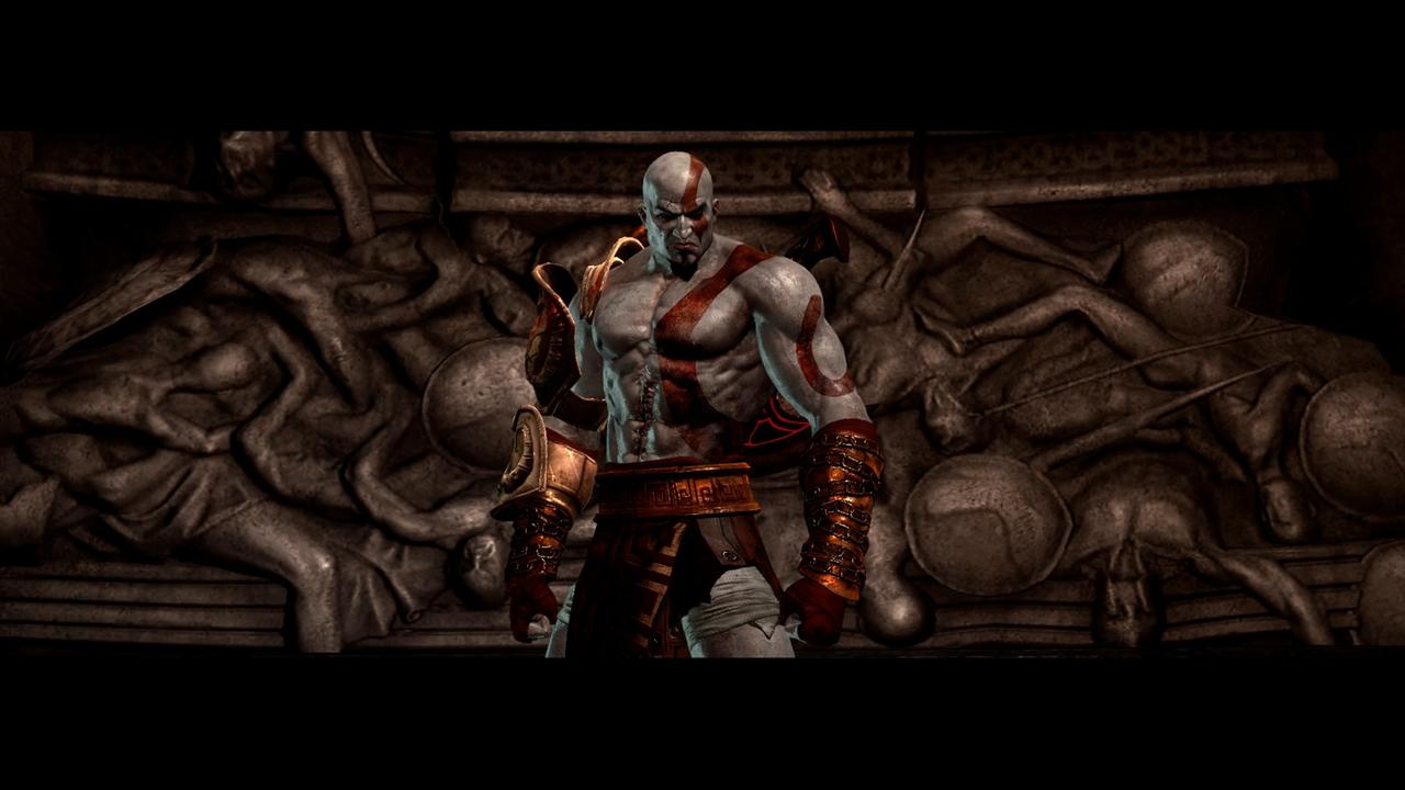 Ein Screenshot aus God of War® III Remastered, der Held Kratos steht grimmig blickend vor einem Relief Ein Screenshot aus God of War® III Remastered, der Held Kratos steht grimmig blickend vor einem Relief