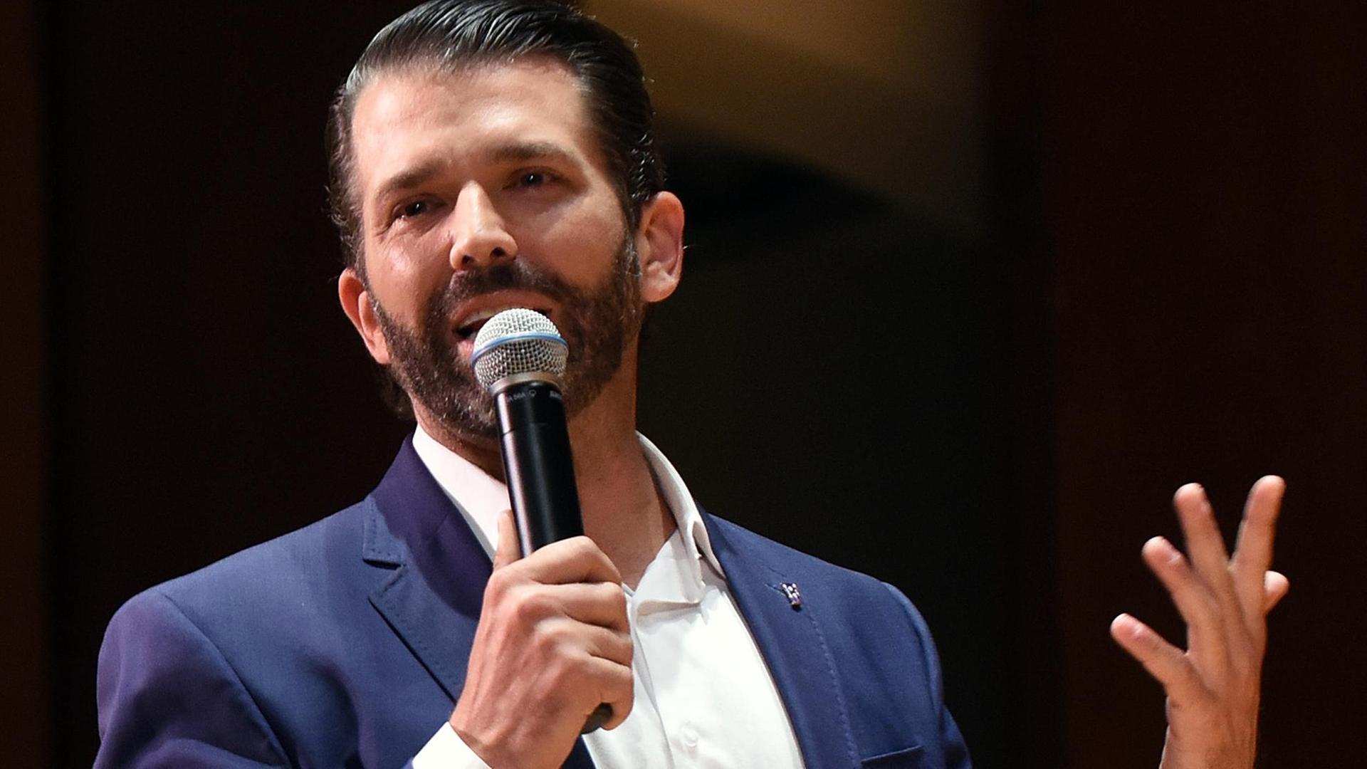 October 10, 2019, Gainesville, Florida, United States: Donald Trump, Jr. speaks at the University of Florida..The couple was paid $50,000 from student activity fees and tickets were distributed free of charge to students. The event drew hundreds of protesters outside the University Auditorium who objected to what they called a campaign rally. Trump, Jr and Guilfoyle spoke for less than a half hour each and answered a few questions submitted on Twitter. Several protesters were removed from the auditorium during the event. Gainesville United States PUBLICATIONxINxGERxSUIxAUTxONLY - ZUMAs197 20191010zaas197153 Copyright: xPaulxHennessyx October 10, 2019, Gainesville, Florida, United States: Donald Trump, Jr. speaks at the University of Florida..The couple was paid $50,000 from student activity fees and tickets were distributed free of charge to students. The event drew hundreds of protesters outside the University Auditorium who objected to what they called a campaign rally. Trump, Jr and Guilfoyle spoke for less than a half hour each and answered a few questions submitted on Twitter. Several protesters were removed from the auditorium during the event. Gainesville United States PUBLICATIONxINxGERxSUIxAUTxONLY - ZUMAs197 20191010zaas197153 Copyright: xPaulxHennessyx