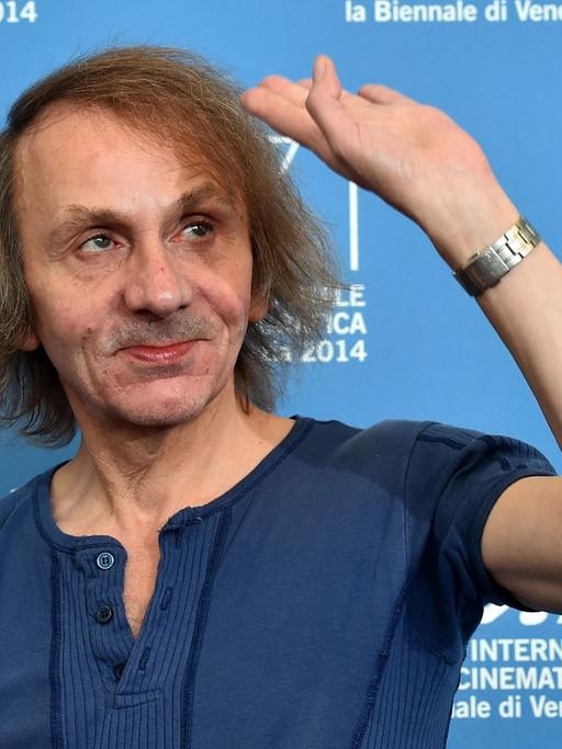 French writer Michel Houellebecq poses during the photocall of the movie "Near Death Experience" presented in the Orizzonti selection at the 71st Venice Film Festival on September 1st, 2014