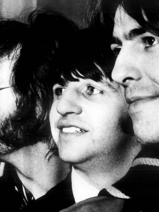 Die Konterfeis der Beatles nebeneinander