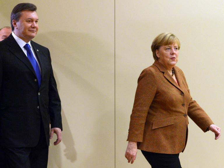 Viktor Janukowitsch und Angela Merkel in Vilnius