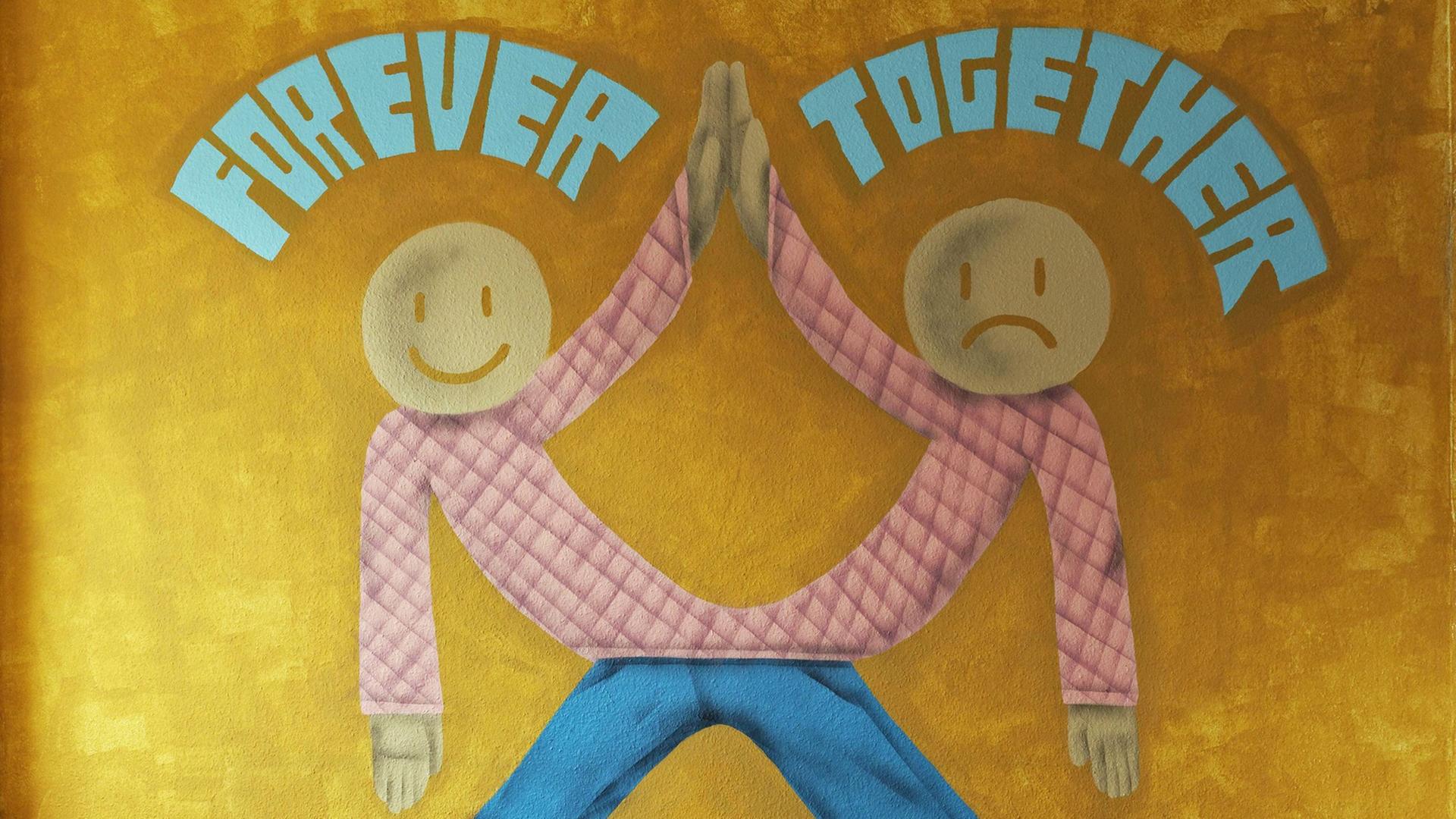 Forever together: Ein Wandbild beim 40 Grad Urban-Art-Festival in Düsseldorf zeigt zwei zusammengewachsene Figuren. Forever together: Ein Wandbild beim 40 Grad Urban-Art-Festival in Düsseldorf zeigt zwei zusammengewachsene Figuren.