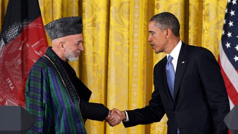 Der afghanische Präsident Hamid Karsai und US-Präsident Barack Obama bei einem Treffen im Januar 2013.