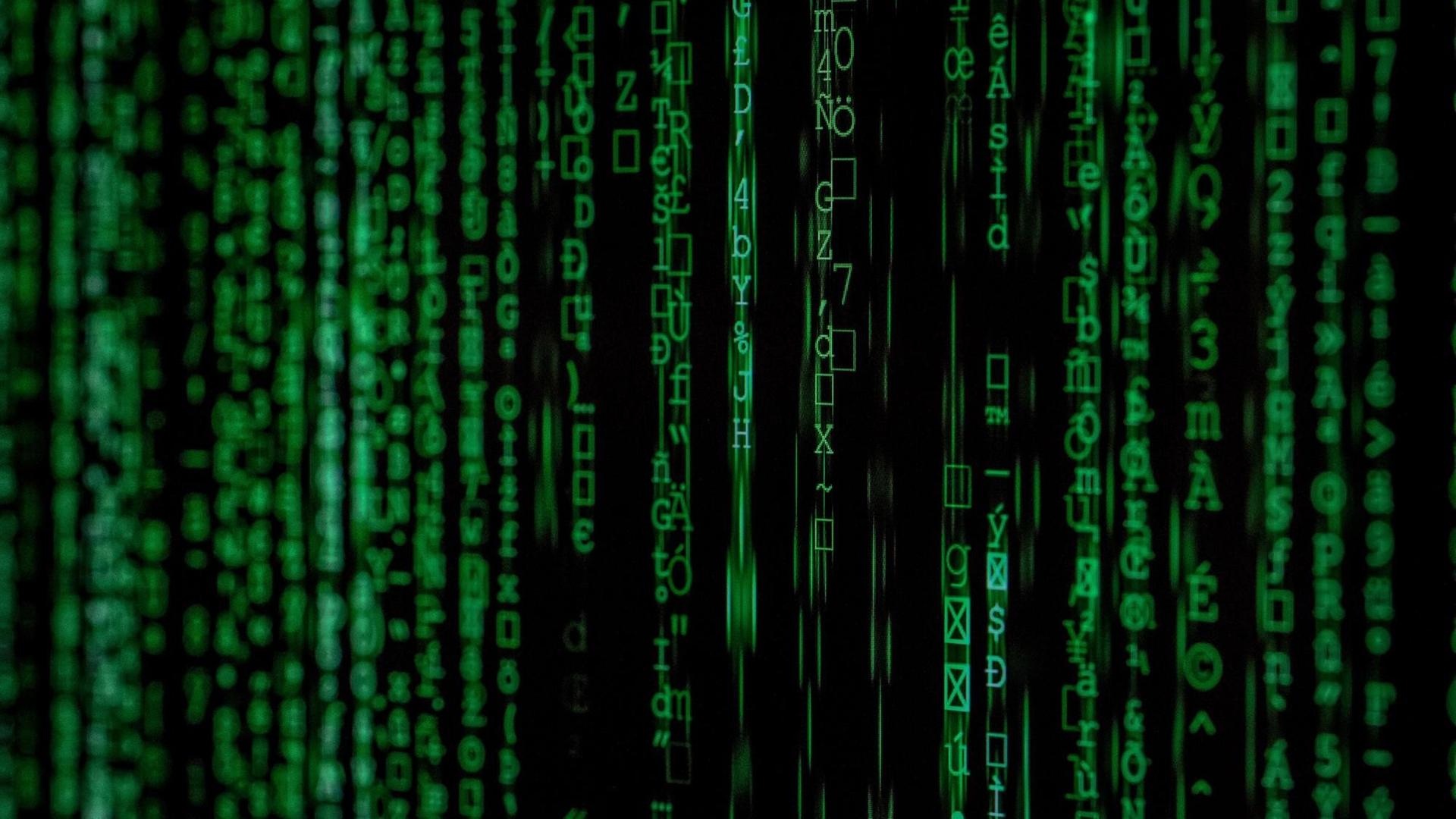 Illustration eines Codes, fliessende grüne Zahlen und Buchstaben auf schwarzem Bildschirm. Illustration eines Codes, fliessende grüne Zahlen und Buchstaben auf schwarzem Bildschirm.