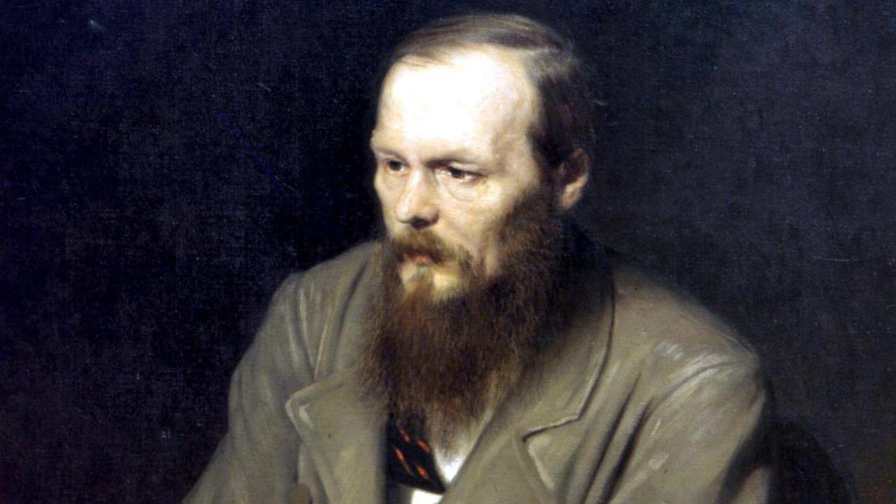 Ein Farbgemälde von Fjodor Dostojewski auf einem Stuhl Ein Farbgemälde von Fjodor Dostojewski auf einem Stuhl