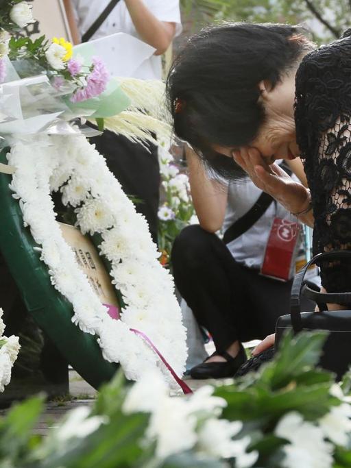 Eine Frau trauert um ihre Schwester, die vor 74 Jahren beim Atombombenabwurf auf Nagasaki getötet wurde.