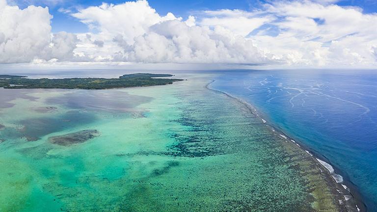 An aerial view above the outer reef and Goofnuw Channel looking south to the island of Yap; Yap, Federated States of Micronesia PUBLICATIONxINxGERxSUIxAUTxONLY Copyright: DavexFleetham 12548762