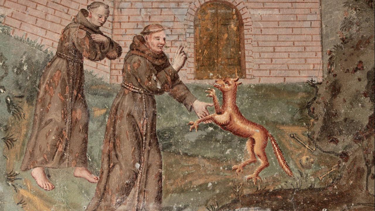 Ein Fresco mit der Darstellung des Franz von Assisi in Gubbio Ein Fresco mit der Darstellung des Franz von Assisi in Gubbio