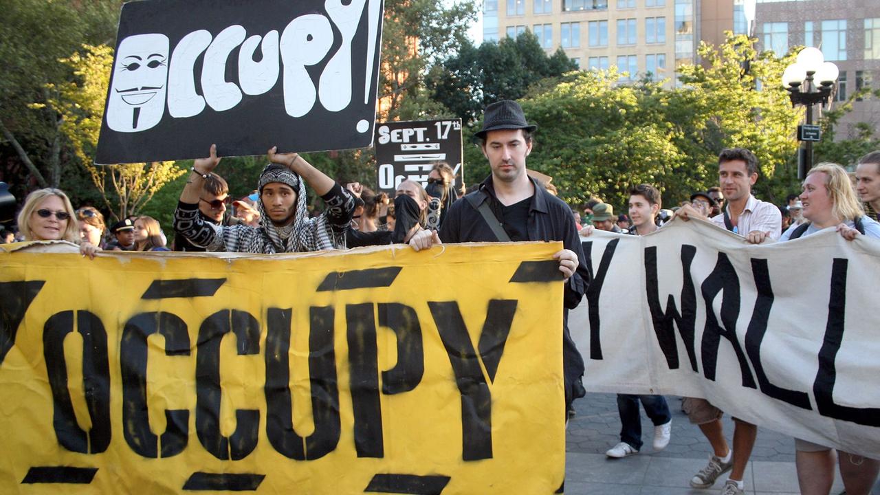 Aktivisten der "Occupy"-Bewegung demonstrieren am 15. September 2012 in New York. Aktivisten der "Occupy"-Bewegung demonstrieren am 15. September 2012 in New York.