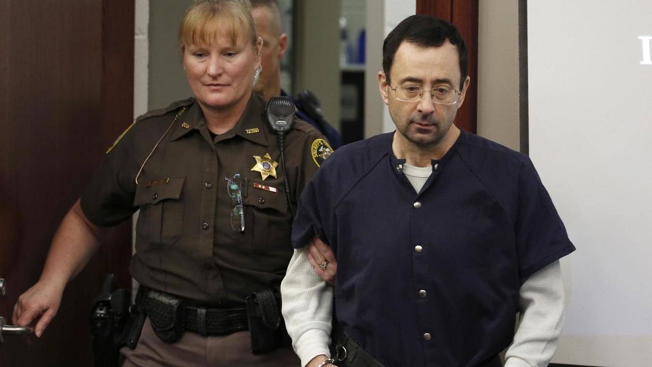 Der frühere Teamarzt der US-Turner, Larry Nassar, vor Gericht in Lansing, Michigan. Der frühere Teamarzt der US-Turner, Larry Nassar, vor Gericht in Lansing, Michigan.