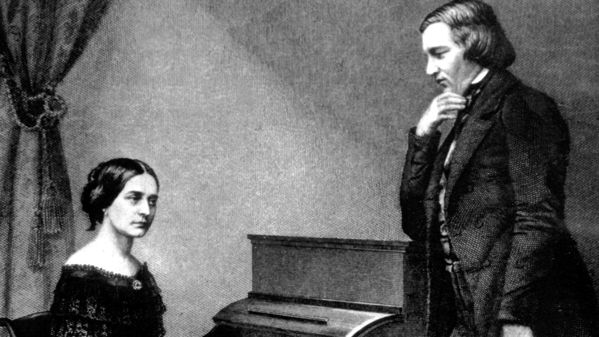 Clara Schumann, geborene Wieck, mit ihrem Mann, dem Komponisten Robert Schumann auf einer zeitgenössischen Darstellung am Klavier sitzend. Clara Schumann, geborene Wieck, mit ihrem Mann, dem Komponisten Robert Schumann auf einer zeitgenössischen Darstellung am Klavier sitzend.