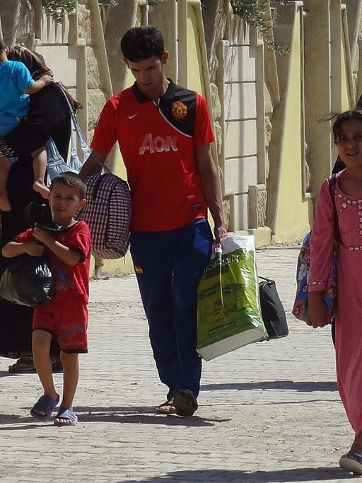 Christen und kurdische Jesiden auf der Flucht im Nordirak