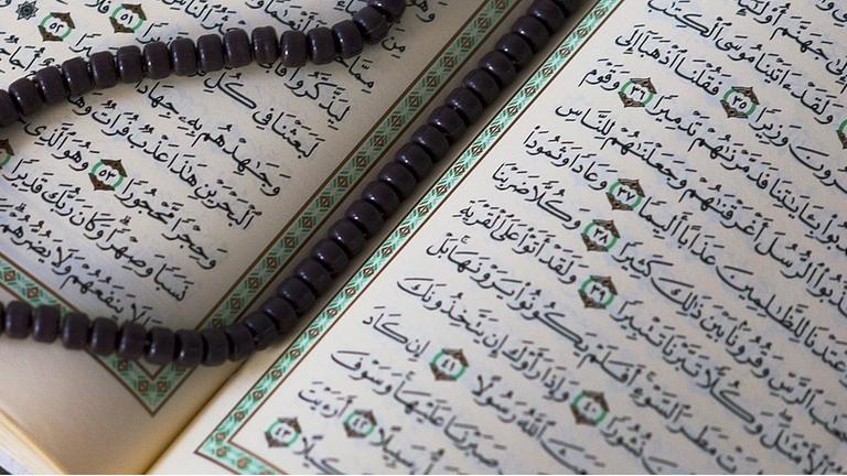 Koran und Gebetskette Koran und Gebetskette