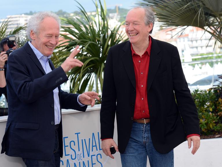 Film directors Jean-Pierre Dardenne, left, and Luc Dardenne at the photocall for the film Two Days, One Night (Deux Jours, Une Nuit) during the 2014 Cannes Film Festival.