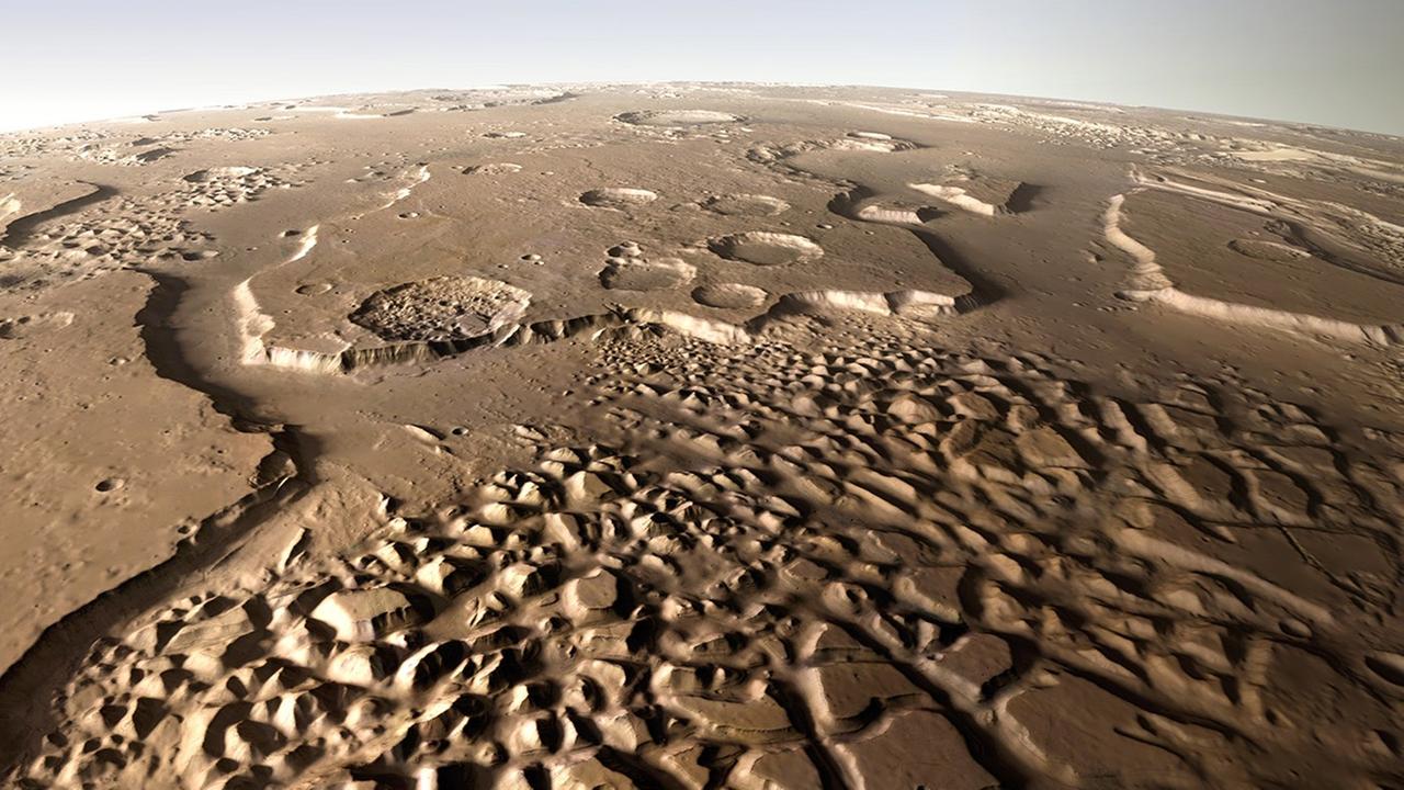 Schrägaufnahme einer Region, in der vermutlich größere Mengen an Grundeis aufgeschmolzen wurden und als Oberflächenwasser bzw. Schlammlawinen abströmten Schrägaufnahme einer Region, in der vermutlich größere Mengen an Grundeis aufgeschmolzen wurden und als Oberflächenwasser bzw. Schlammlawinen abströmten