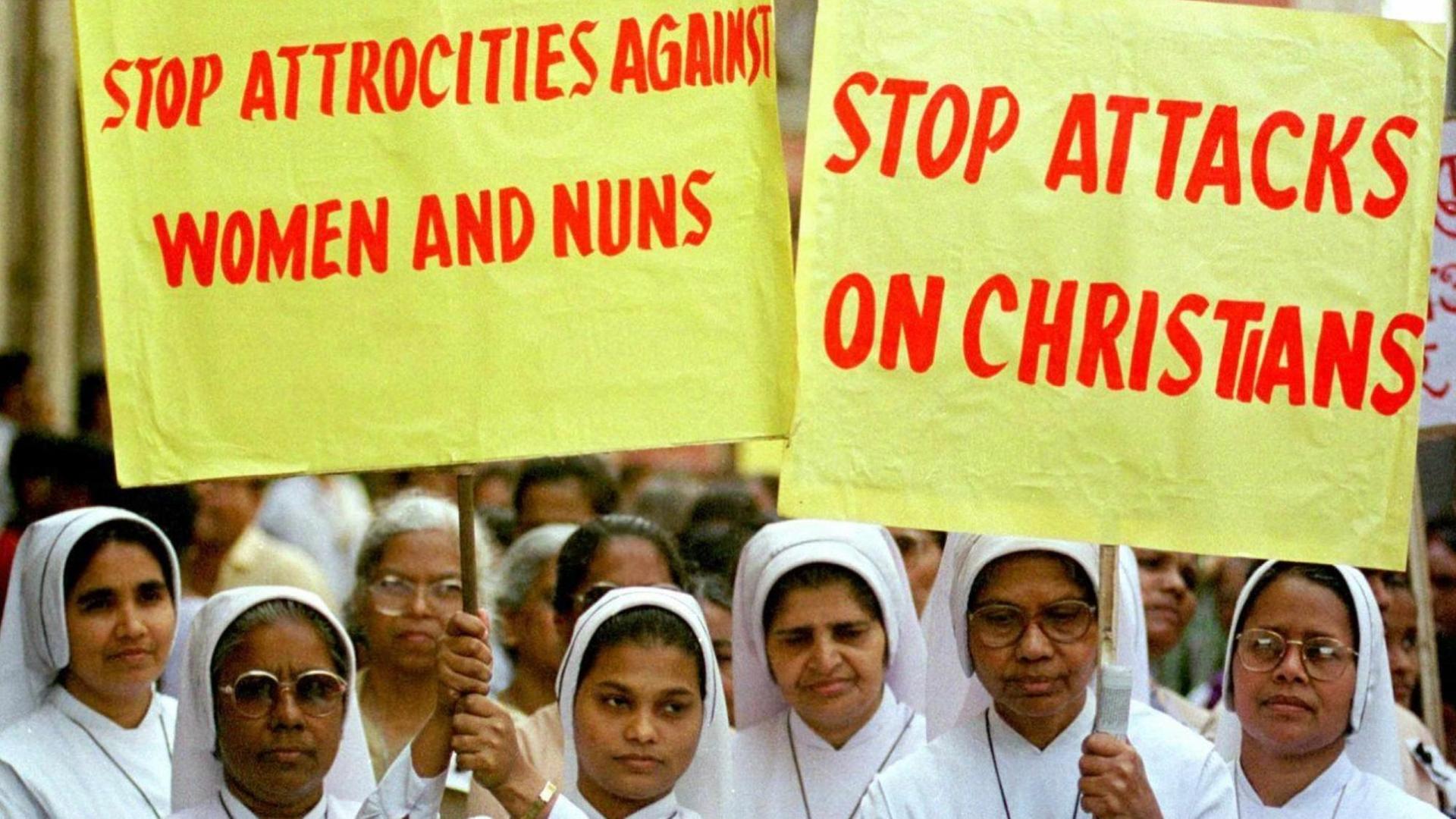 Sisters of the Missionaries of Charity hold placards during a protest by Calcutta's Christian community, Thursday, 11 February 1999 against attacks on Christians and nuns by Hindu fundamentalists. Almost 100,000 people participated in the rally. dpa | Sisters of the Missionaries of Charity hold placards during a protest by Calcutta's Christian community, Thursday, 11 February 1999 against attacks on Christians and nuns by Hindu fundamentalists. Almost 100,000 people participated in the rally. dpa |