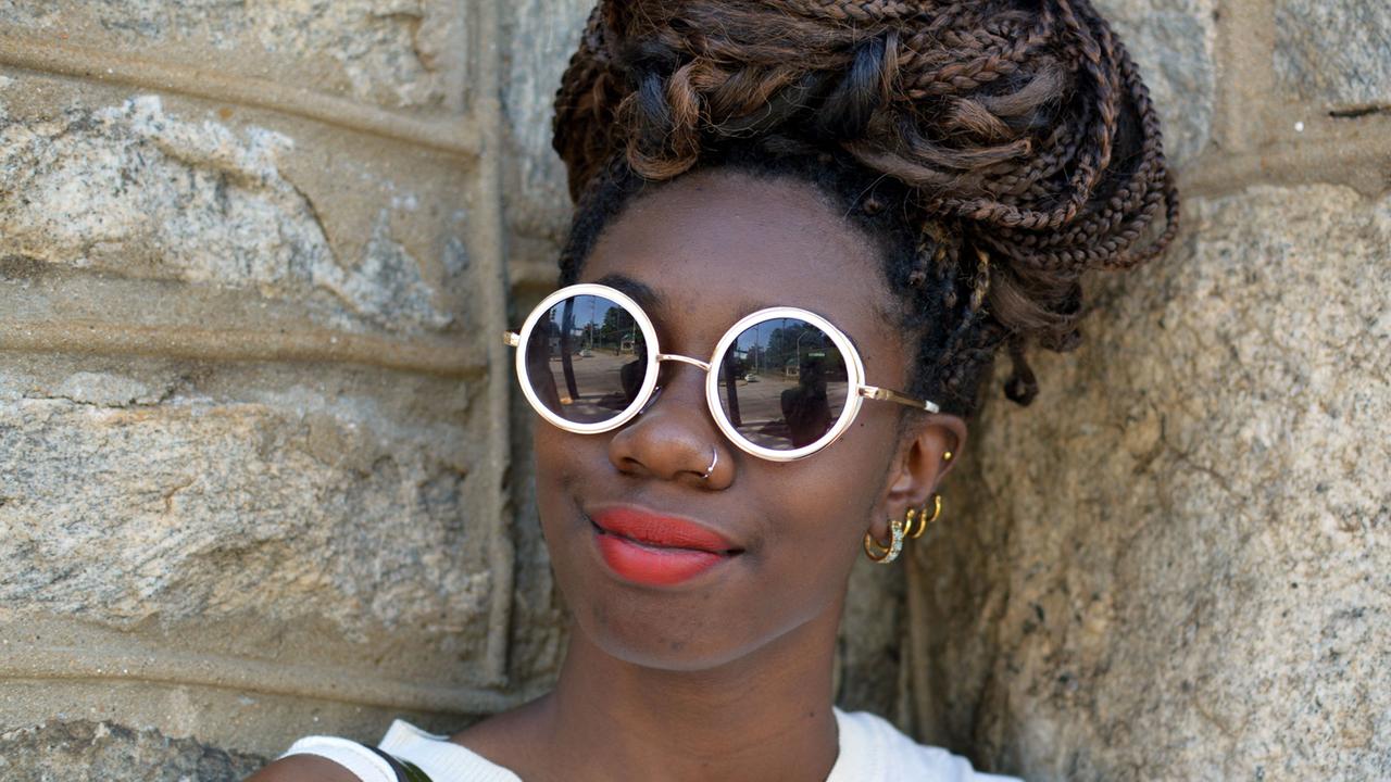 Kandice Fowlkes (19): Englisch-Studentin an der Clark Atlanta University. Besucht das Historical Black College, wo den Studenten beigebracht werde, "Widerstand gegen die mentale Sklaverei zu leisten.” Kandice Fowlkes (19): Englisch-Studentin an der Clark Atlanta University. Besucht das Historical Black College, wo den Studenten beigebracht werde, "Widerstand gegen die mentale Sklaverei zu leisten.”