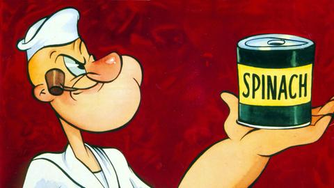 Die Comicfigur Popeye mit einer Dose Spinat