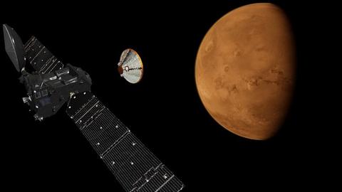 Der ExoMars Trace Gas Orbiter und die Landekapsel Schiaparelli beim Anflug auf Mars (Zeichnung).