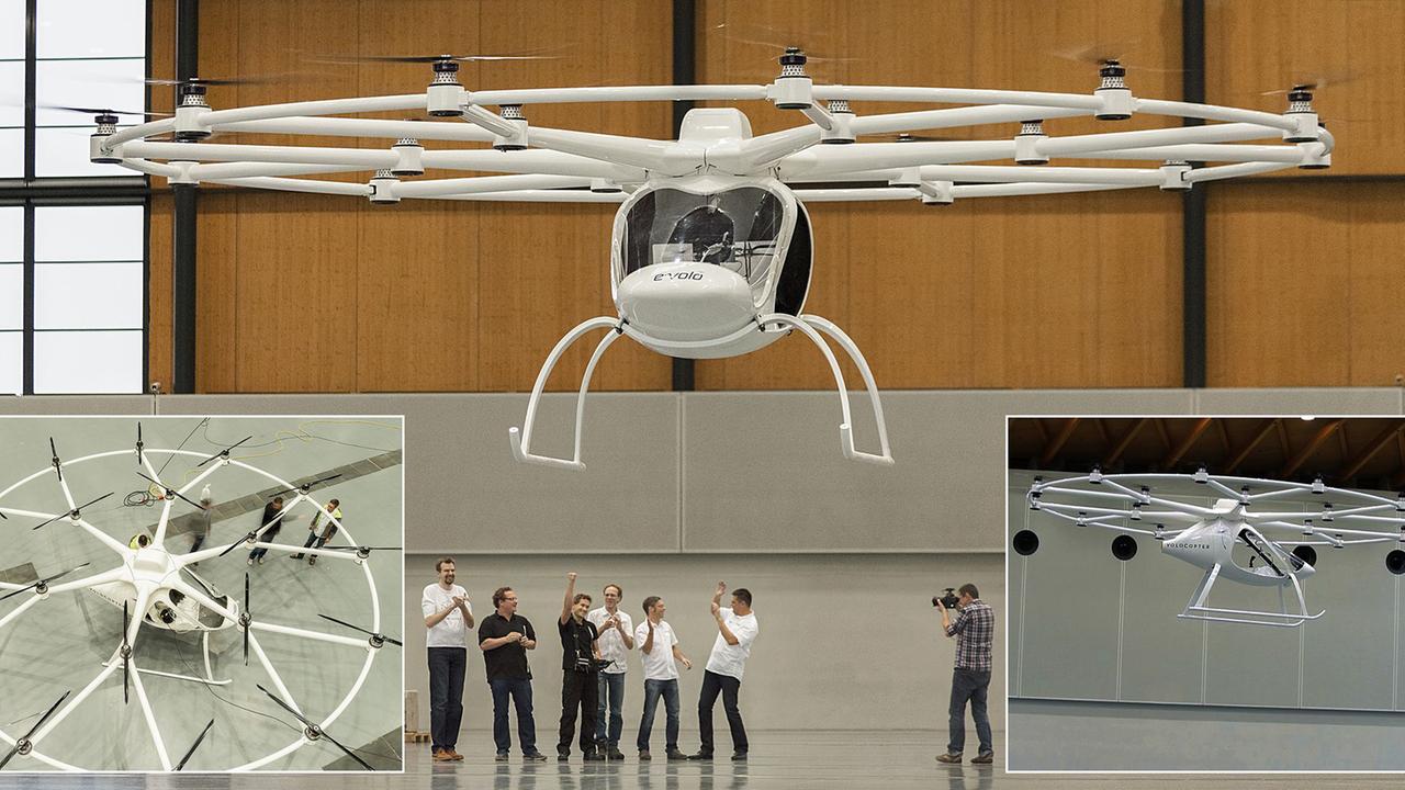 Der e-Volo-Multikopter flog zum ersten Mal in einer Halle. Er ist ein einsitziges Luftfahrzeug mit zahlreichen Rotoren.
