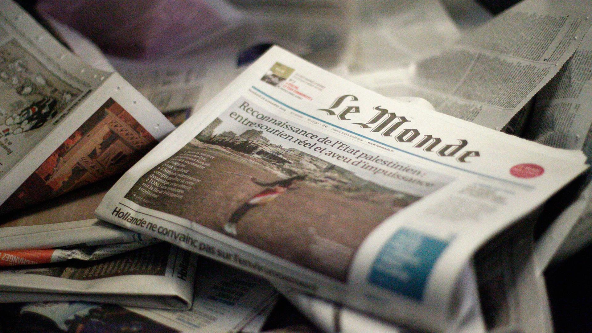 Heute erscheint sie mit Fotos: Die französische Tageszeitung "Le Monde" vom 27. November 2014 Heute erscheint sie mit Fotos: Die französische Tageszeitung "Le Monde" vom 27. November 2014
