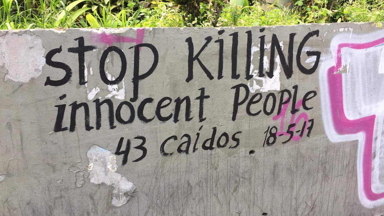 Ein Graffiti auf einer Mauer in Venezuela, das ein Ende des Tötens fordert. Ein Graffiti auf einer Mauer in Venezuela, das ein Ende des Tötens fordert.
