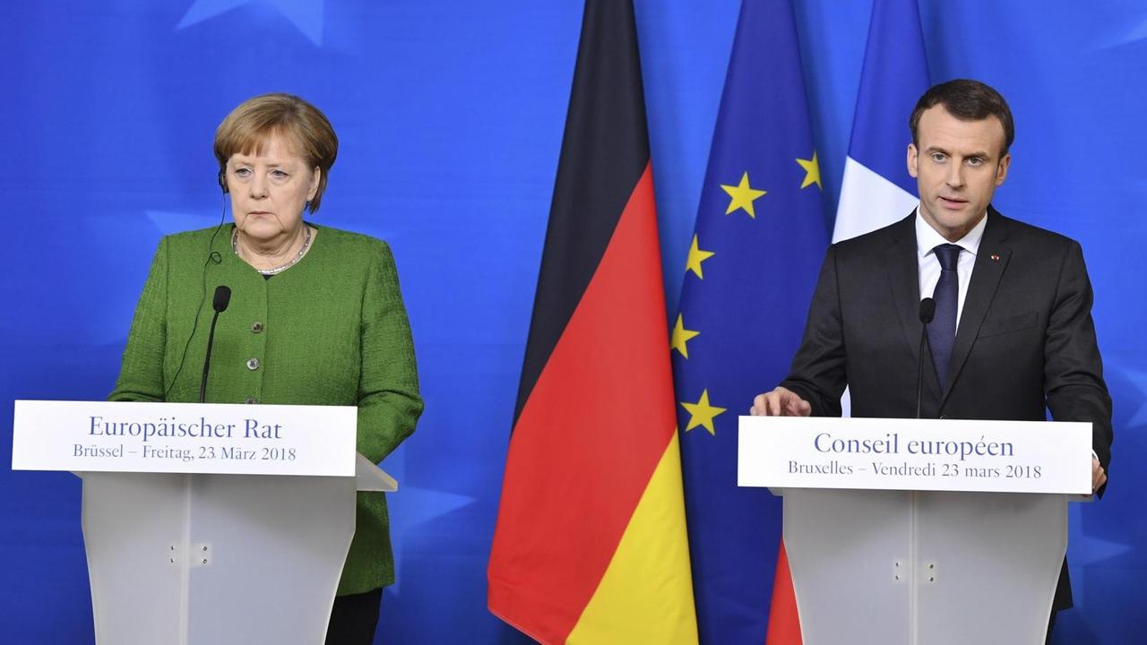 Bundeskanzlerin Merkel und Frankreichs Präsident Macron nach dem EU-Gipfel in Brüssel am 23. März 2018 Bundeskanzlerin Merkel und Frankreichs Präsident Macron nach dem EU-Gipfel in Brüssel am 23. März 2018