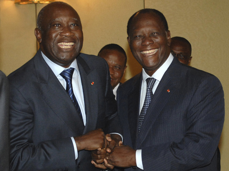 Der Präsident der Elfenbeinküste, Laurent Gbagbo und sein Herausforderer Alassane Ouattara