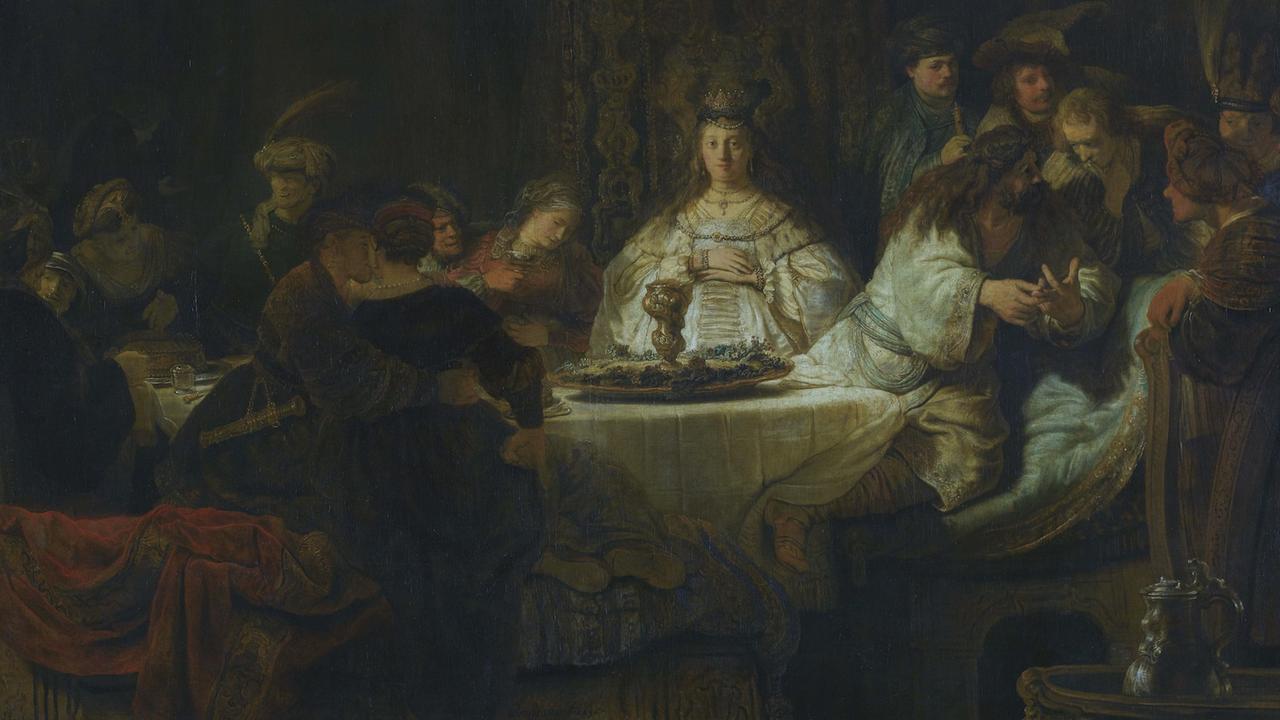 Samson sitzt neben seiner Braut an der Hochzeitstafel und gibt ein Rätsel auf – gemalt von Rembrandt. Samson sitzt neben seiner Braut an der Hochzeitstafel und gibt ein Rätsel auf – gemalt von Rembrandt.