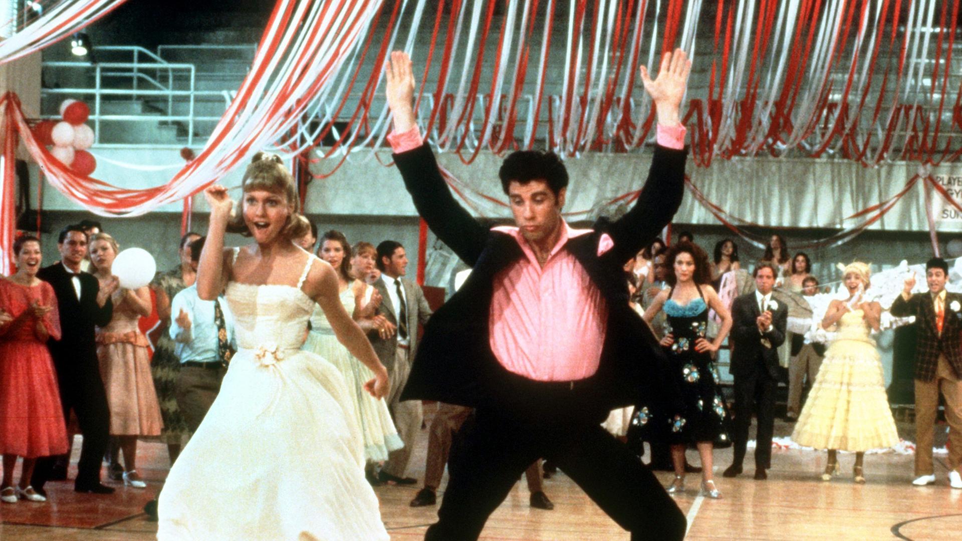 Olivia Newton-John und John Travolta in einer Tanzszene des Highschool-Musicals "Grease" aus dem Jahr 1978. Olivia Newton-John und John Travolta in einer Tanzszene des Highschool-Musicals "Grease" aus dem Jahr 1978.