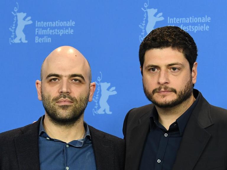 Der Schriftsteller Roberto Saviano (li.) und der Regisseur Claudio Giovannesi bei einem Photocall zum Film "Piranhas" auf der Berlinale 2019.