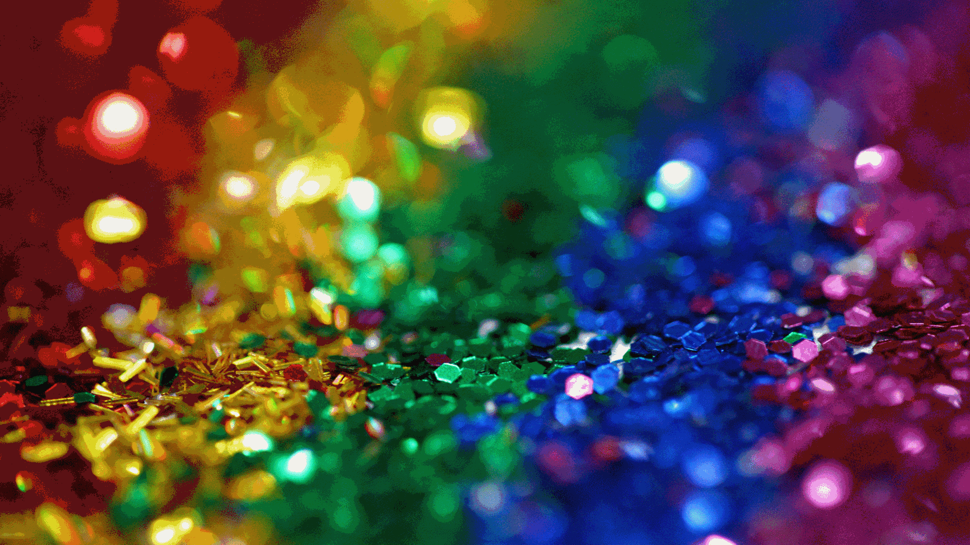 Viele bunte Glassplitter, aufgereiht in Streifen in den Farben rot, gleb grün, blau und wieder pink (von links nach rechts) Viele bunte Glassplitter, aufgereiht in Streifen in den Farben rot, gleb grün, blau und wieder pink (von links nach rechts)