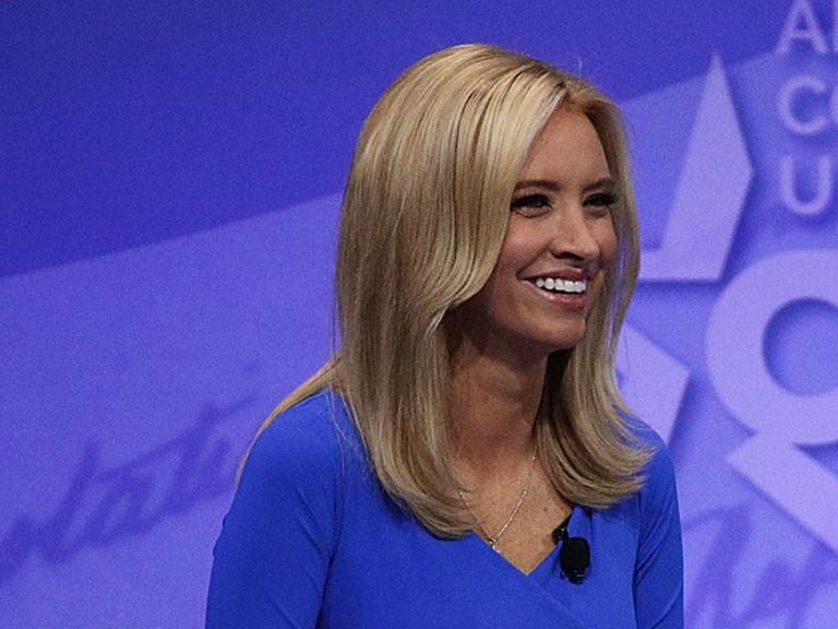 (FILES) This file photo taken on February 22, 2017 shows US Secretary of Education Betsy DeVos (R) as she participates in a conversation with political commentator Kayleigh McEnany during the Conservative Political Action Conference at the Gaylord National Resort and Convention Center in National Harbor, Maryland. Kayleigh McEnany, a conservative television pundit and supporter of President Donald Trump, was named the spokeswoman for the Republican Party on August 7, 2017. McEnany, 29, announced over the weekend that she had left CNN, the 24-hour cable news network where she had been working as a pro-Trump contributor.