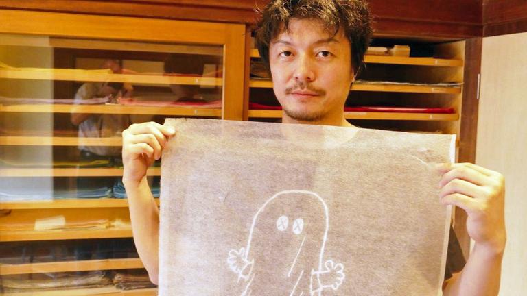 Hironao Hamada zeigt das Ergebnis seiner Arbeit Hironao Hamada zeigt das Ergebnis seiner Arbeit