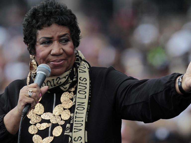 The Queen of Soul, Aretha Franklin sings at a Labor Day event which featured US President Barack Obama outside of the Renaissance center in Detroit, Michigan USA on 05 September 2011.
