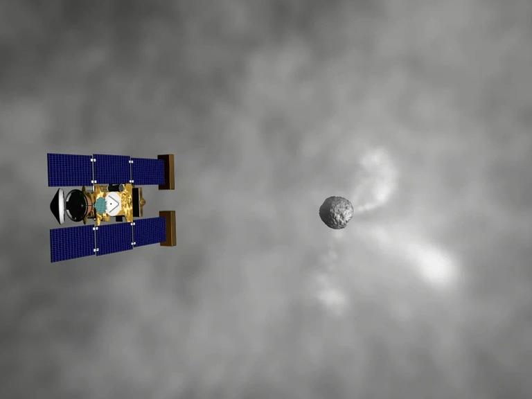 Künstlerische Darstellung der Begegnung von Stardust mit dem Kometen Wild-2 Künstlerische Darstellung der Begegnung von Stardust mit dem Kometen Wild-2