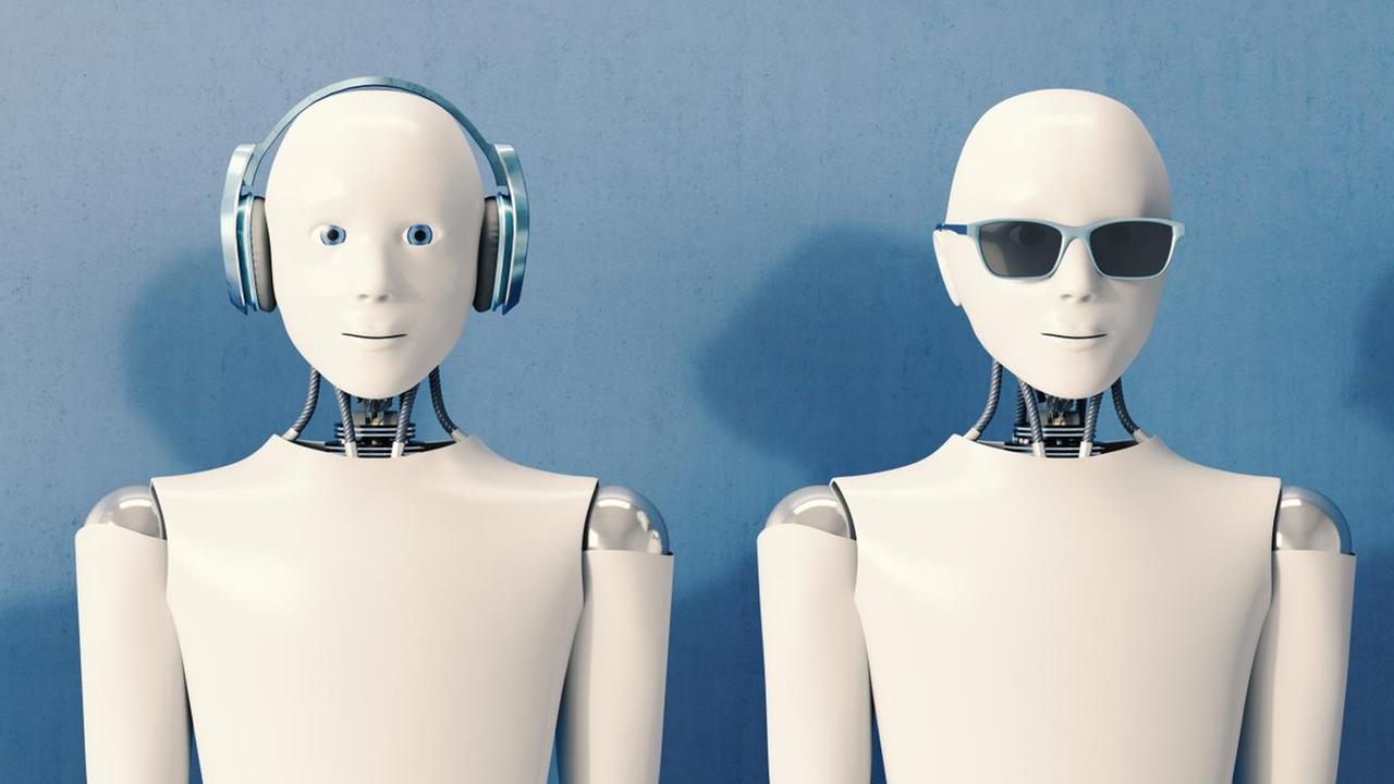 Zwei menschlich aussehende Roboter, einer trägt Kopfhörer, der andere eine Sonnenbrille. Zwei menschlich aussehende Roboter, einer trägt Kopfhörer, der andere eine Sonnenbrille.